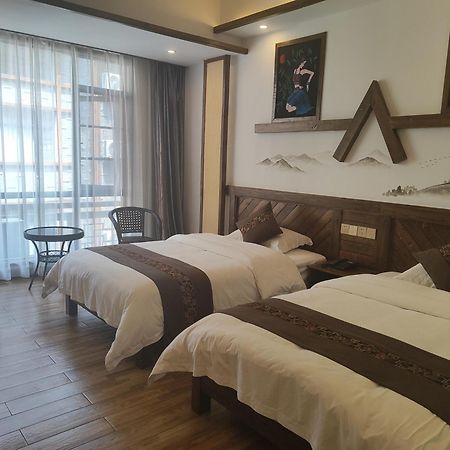Louzhongxiaoge Inn Улинъюань Экстерьер фото