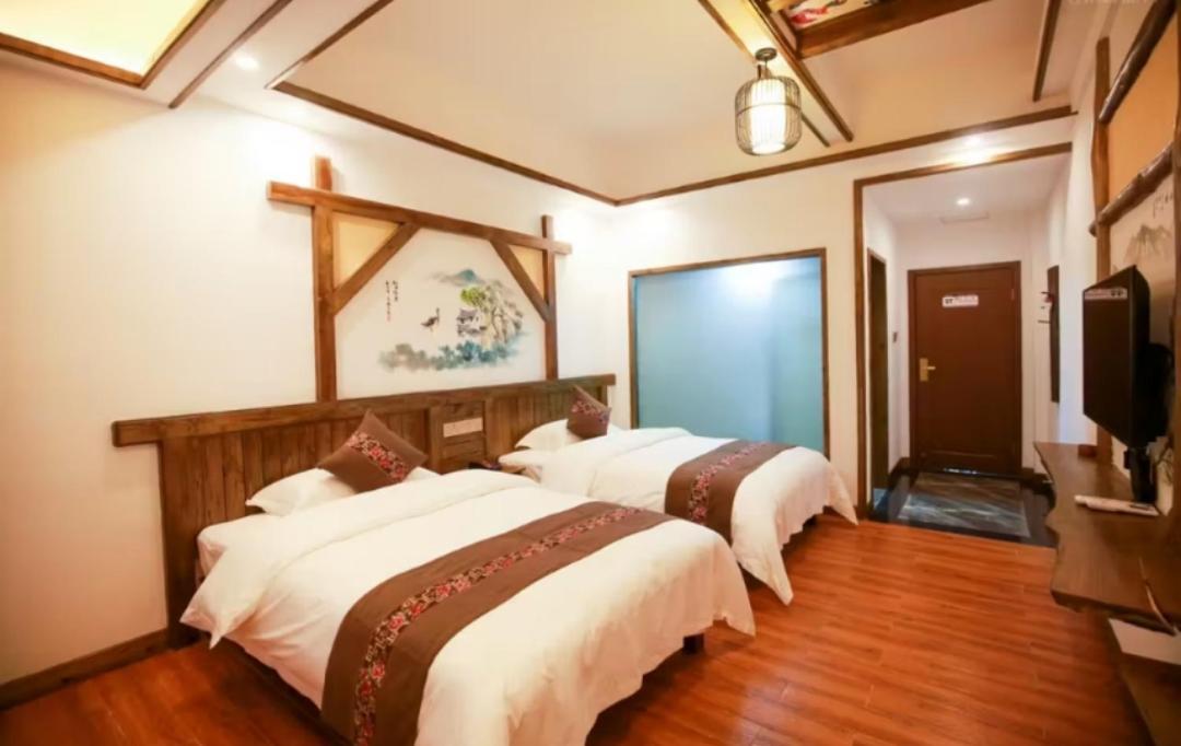 Louzhongxiaoge Inn Улинъюань Экстерьер фото